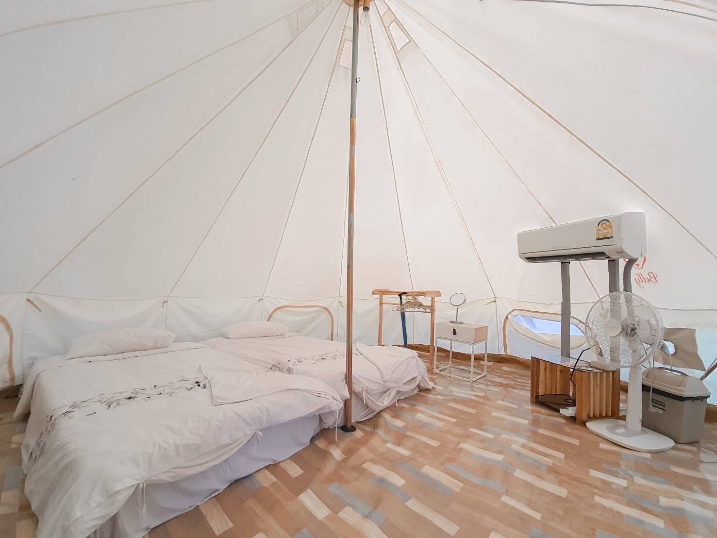 twin beds inside a mae ngam deluxe camping tent, surin islands